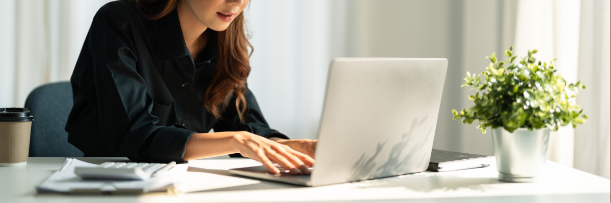 Nonprofit board treasurer working on her laptop